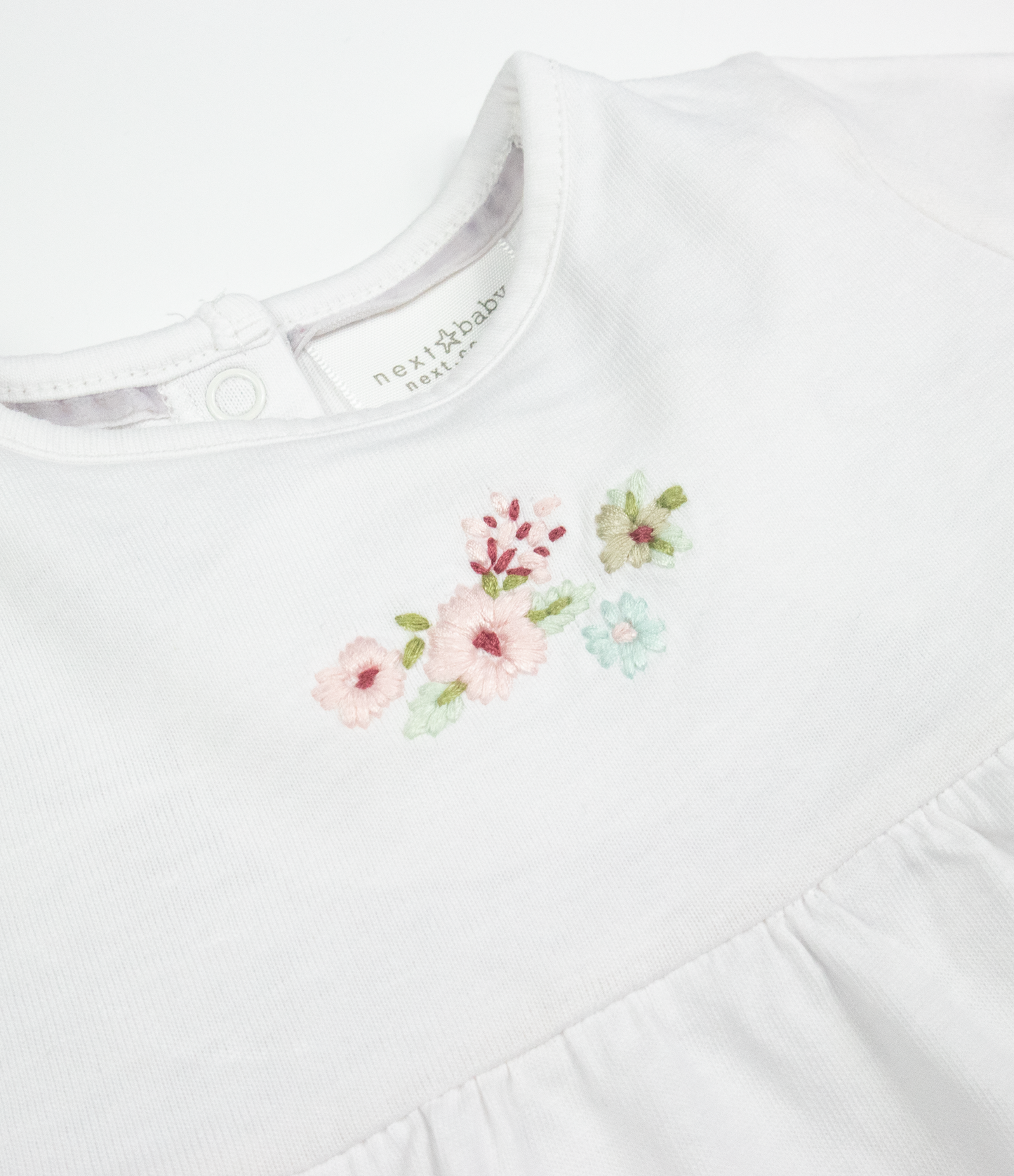 Embroidered skirted top